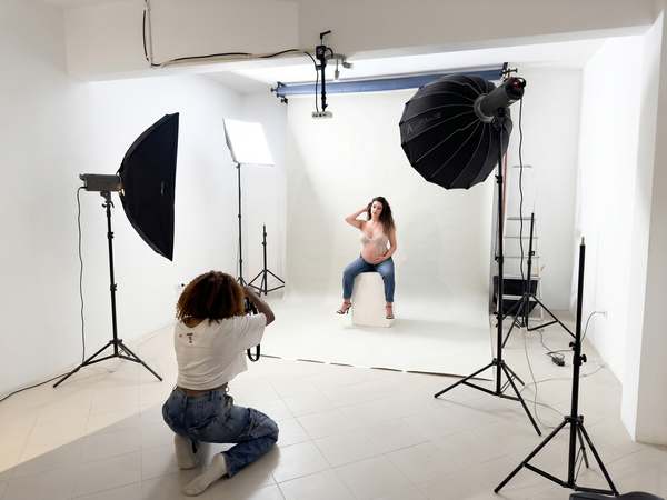Photography studio with Profoto lighting and white backdrop at Kreators by bridgr in Alfama