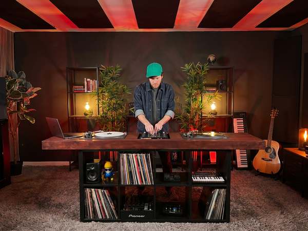 DJ booth with Pioneer CDJs and vinyl records at Kreators by bridgr in Lisbon